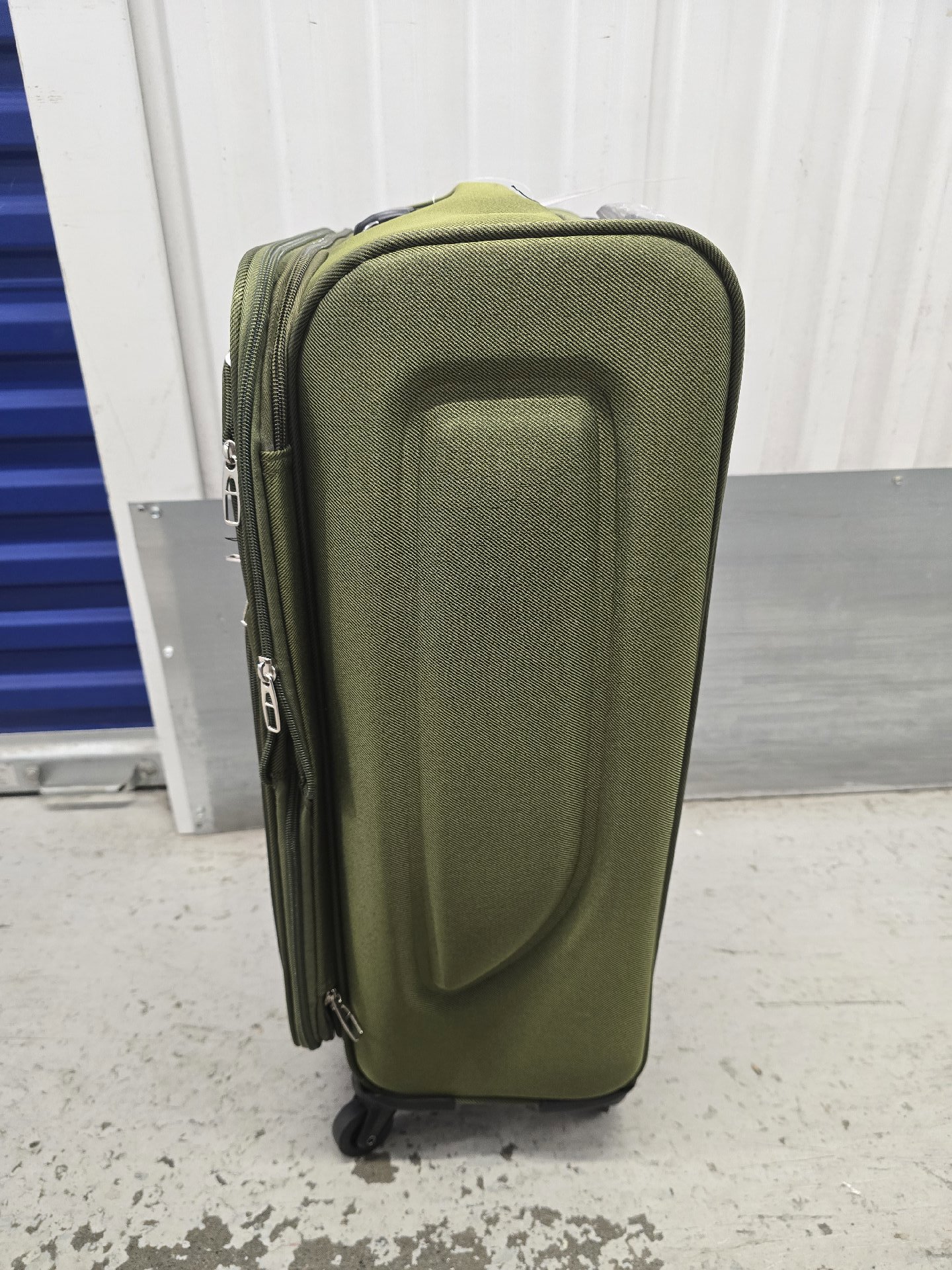 24 inch TN Green Softshell Suitcase with Wheels, TN, One Size, Excellent condition — preloved on SilentSale®