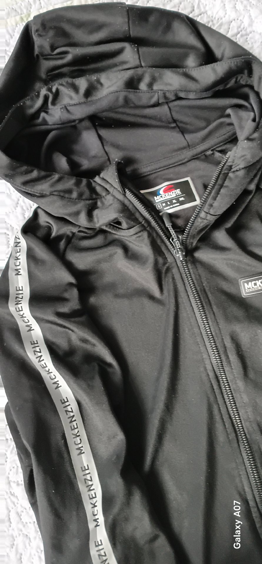 McKenzie Black Zip Up Hoodie with Logo Tape Detail – Size M, McKenzie, M, Excellent condition — preloved on SilentSale®