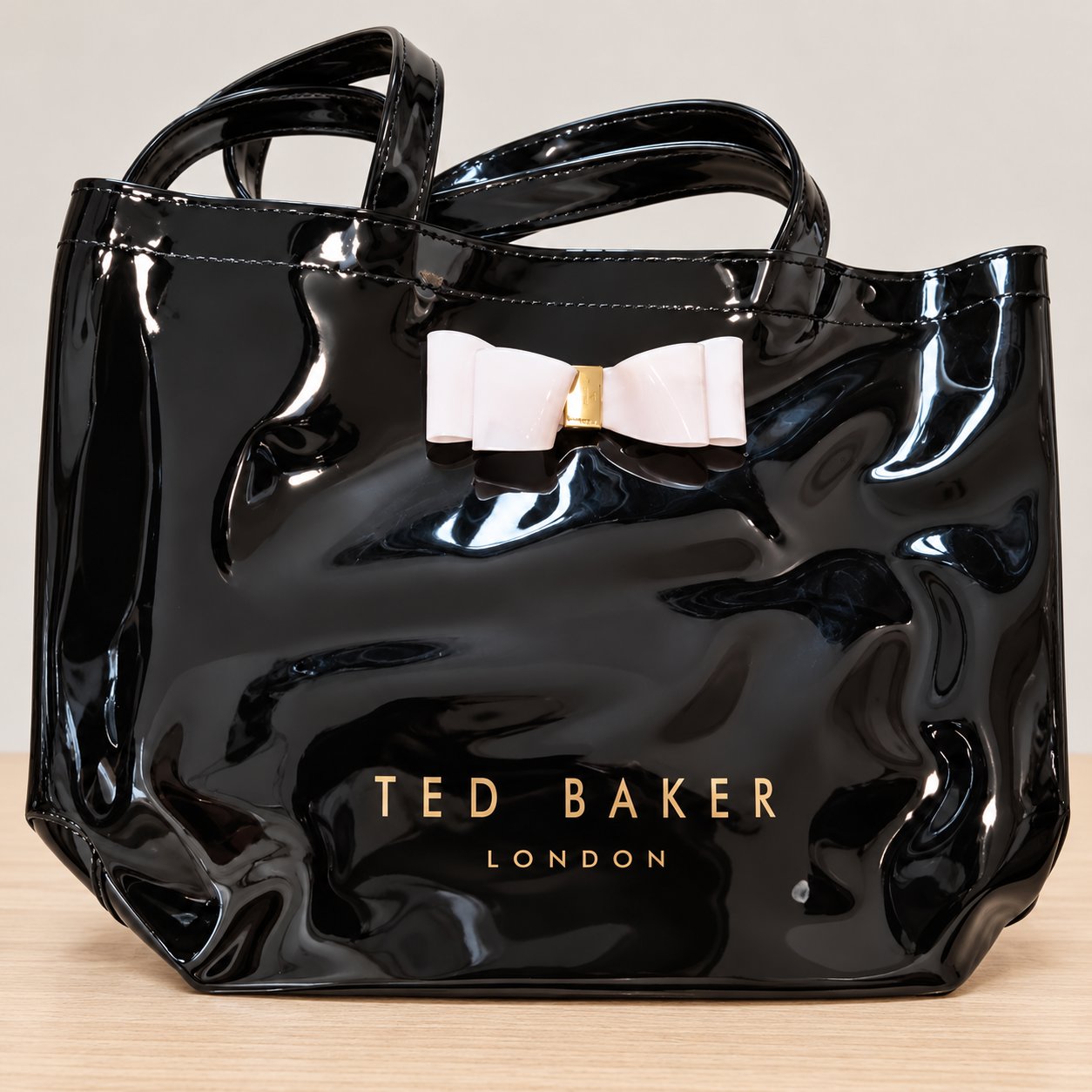 Ted Baker Black Patent Tote Bag with Pink Bow, Ted Baker, Tote, Excellent condition — preloved on SilentSale®