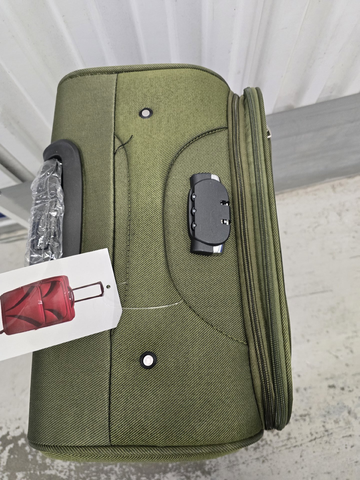 24 inch TN Green Softshell Suitcase with Wheels, TN, One Size, Excellent condition — preloved on SilentSale®