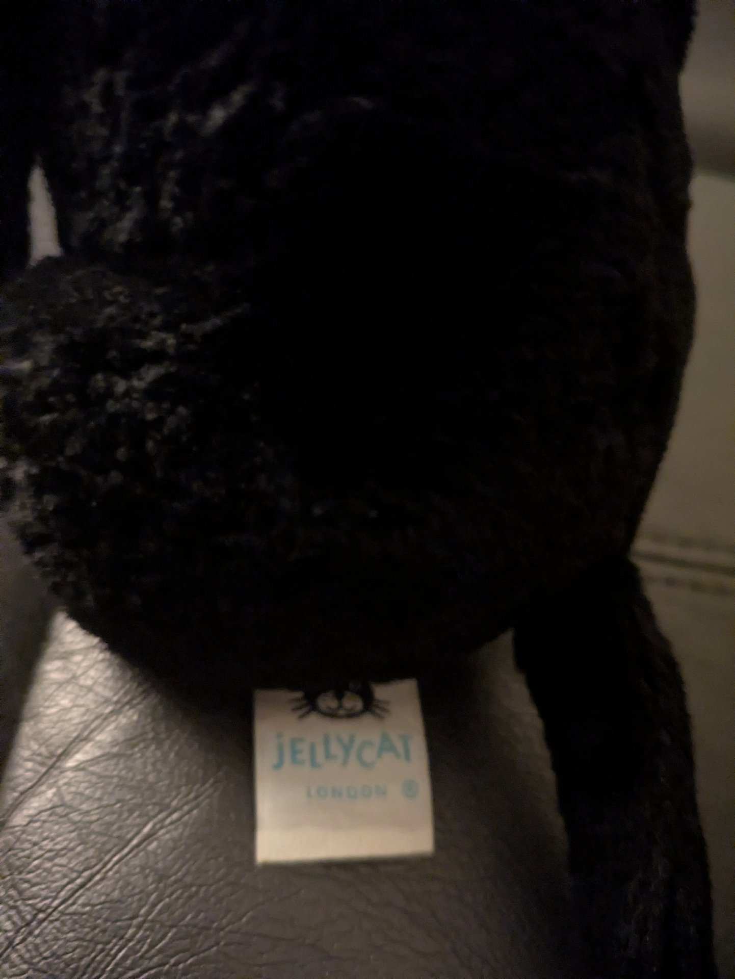 Black Plush Dog Toy with Red Santa Hat and Bow, Jellycat, 50 cm, Excellent condition — preloved on SilentSale®