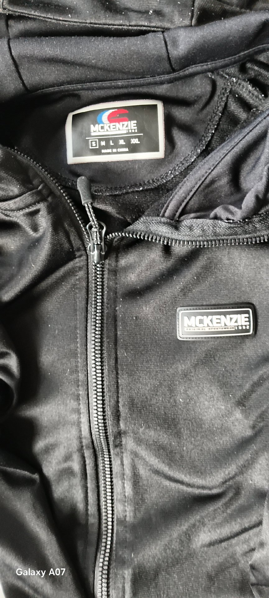 McKenzie Black Zip Up Hoodie with Logo Tape Detail – Size M, McKenzie, M, Excellent condition — preloved on SilentSale®
