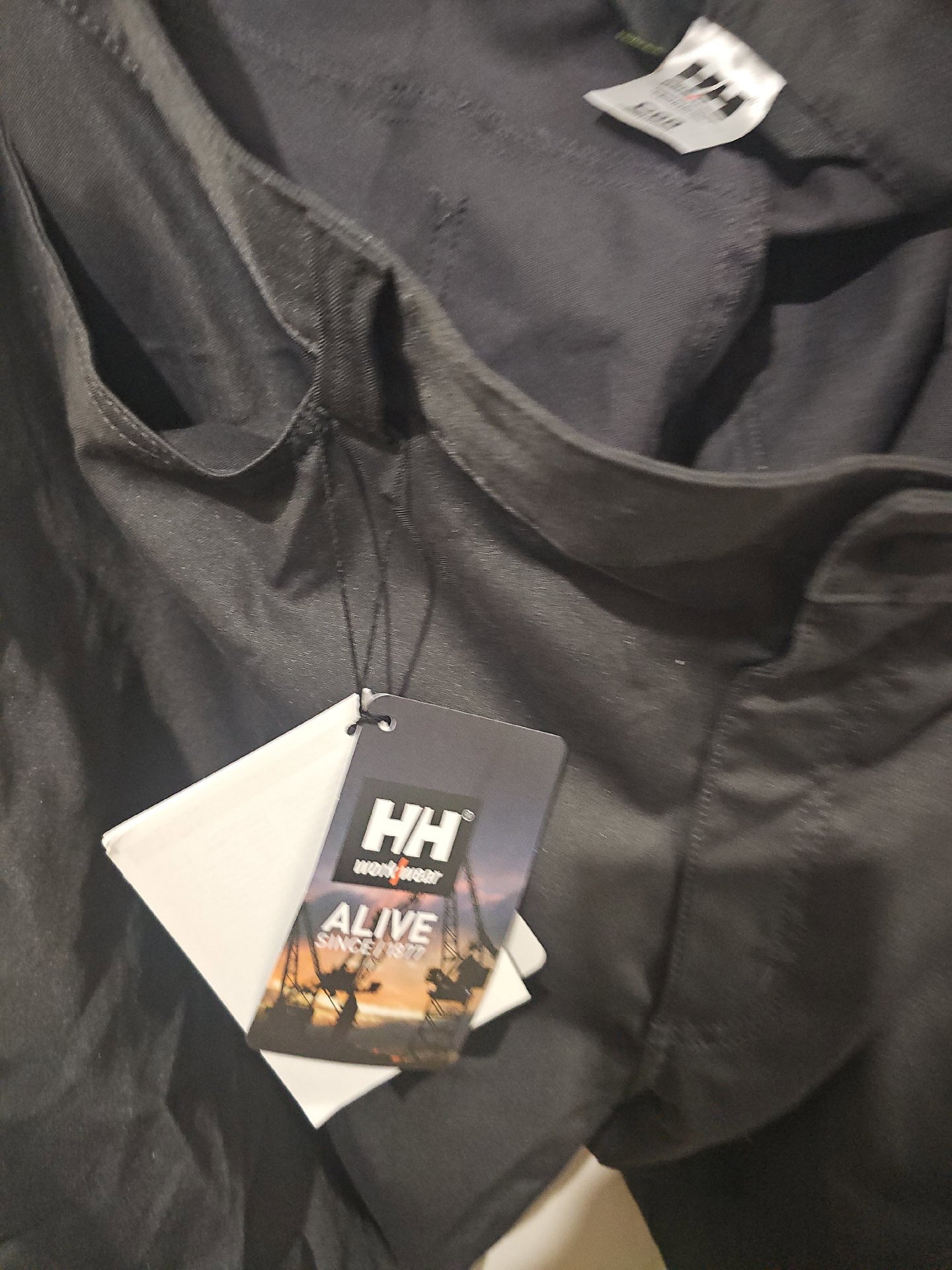 Helly Hansen Workwear Black Hi-Vis Work Trousers – Size C66, Helly Hansen, C66, New condition — preloved on SilentSale®