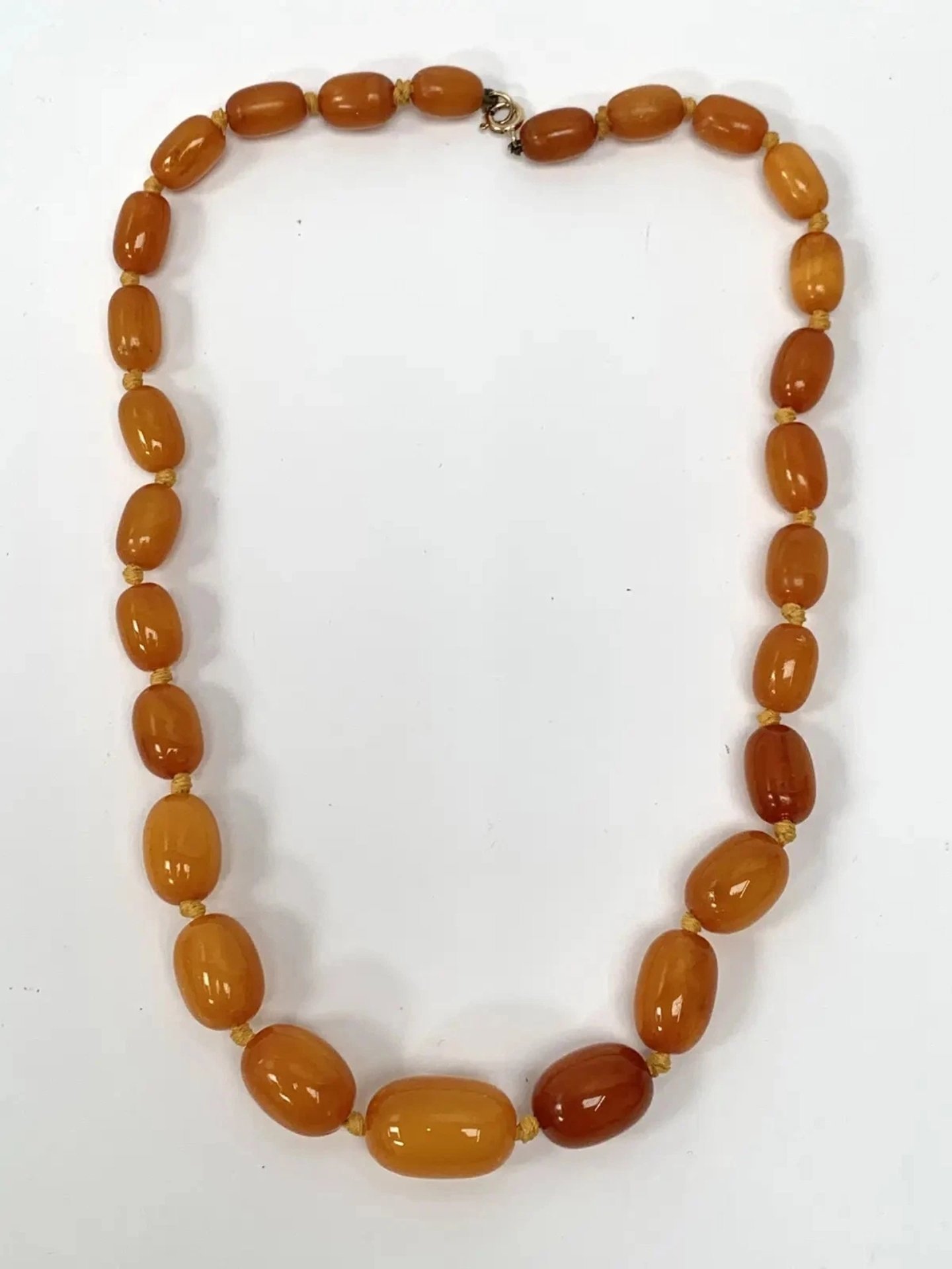 Vintage Amber Bead Necklace with 9ct Gold Clasp: Graduated Oval, 32gm, 50cm, Vintage, One Size, Excellent condition — preloved on SilentSale®
