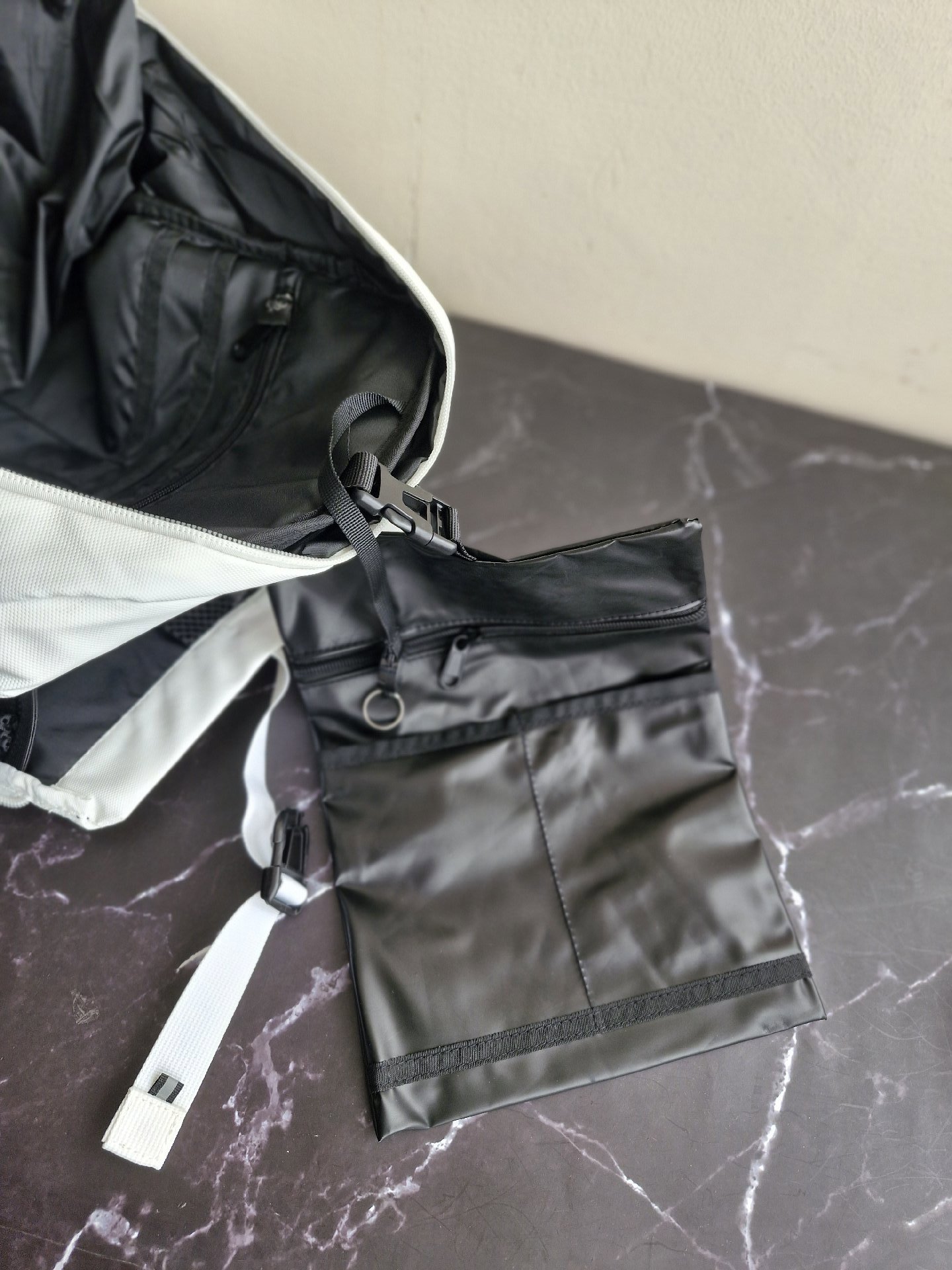 UMGG White Roll Top Backpack with Black Mesh Pockets, Umgg, One Size, New condition — preloved on SilentSale®