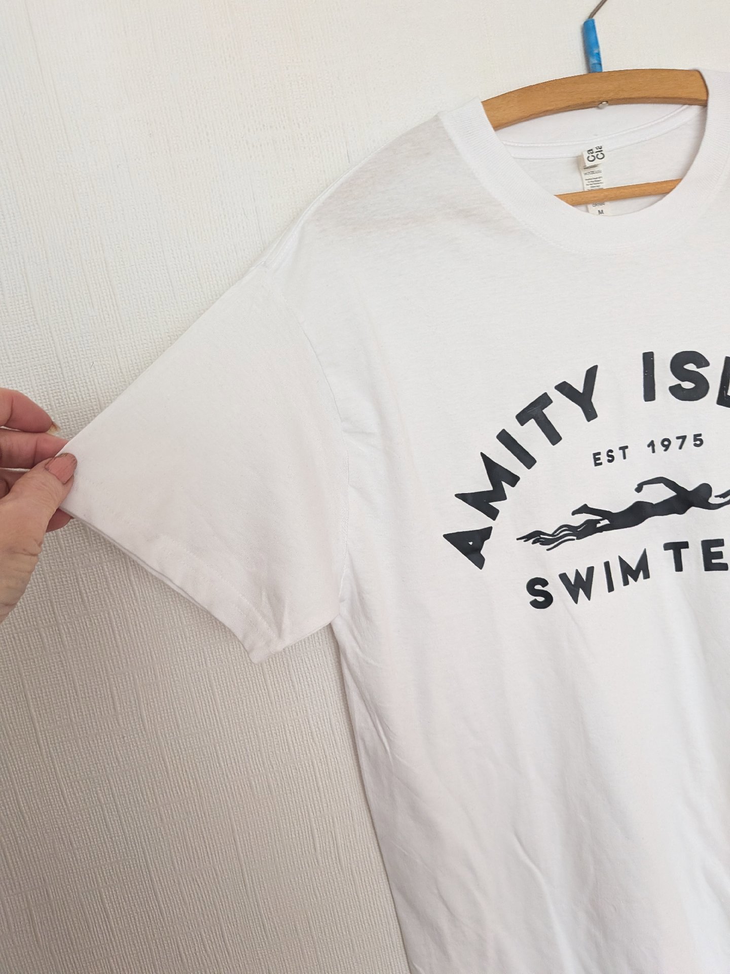 Casual Classics White Amity Island Swim Team T-Shirt – M, Casual Classics, M, New condition — preloved on SilentSale®