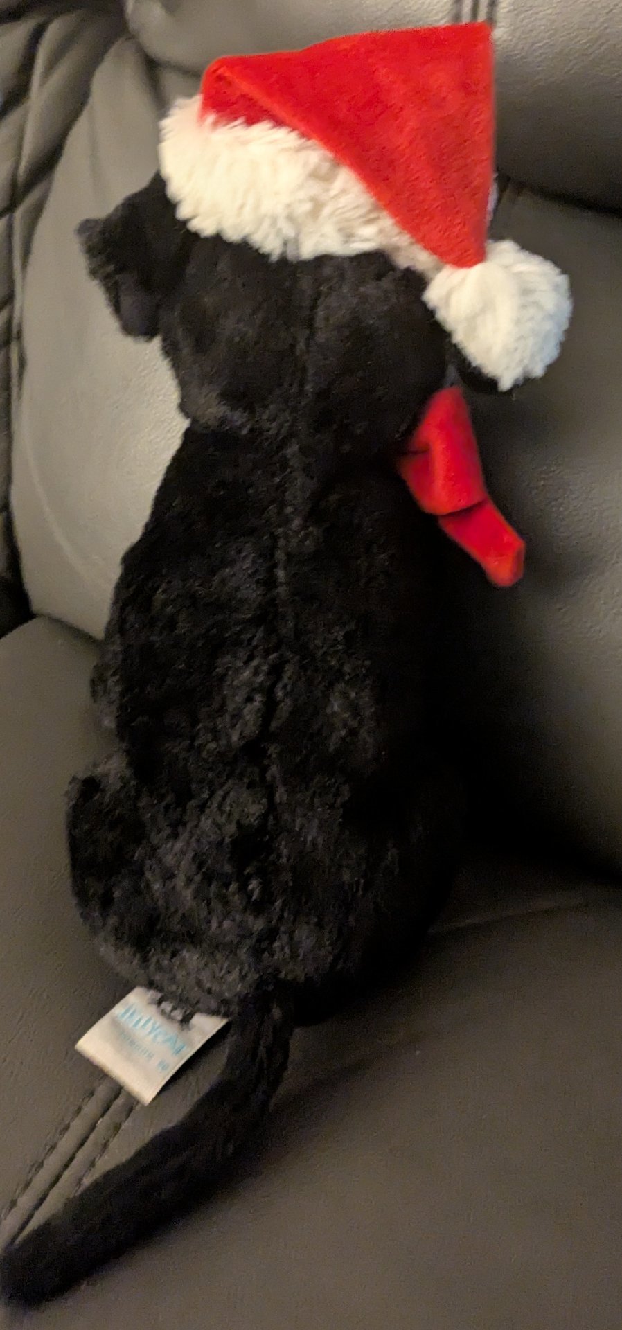 Black Plush Dog Toy with Red Santa Hat and Bow, Jellycat, 50 cm, Excellent condition — preloved on SilentSale®