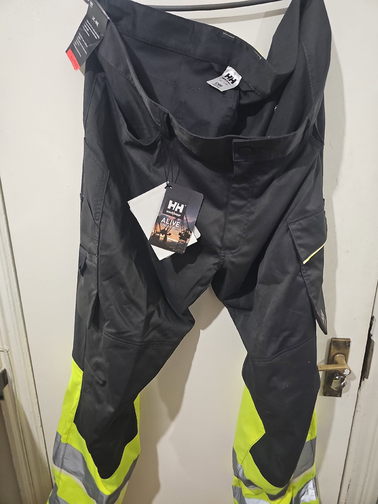 Helly Hansen Workwear Black Hi-Vis Work Trousers – Size C66, Helly Hansen, C66, New condition — preloved on SilentSale®