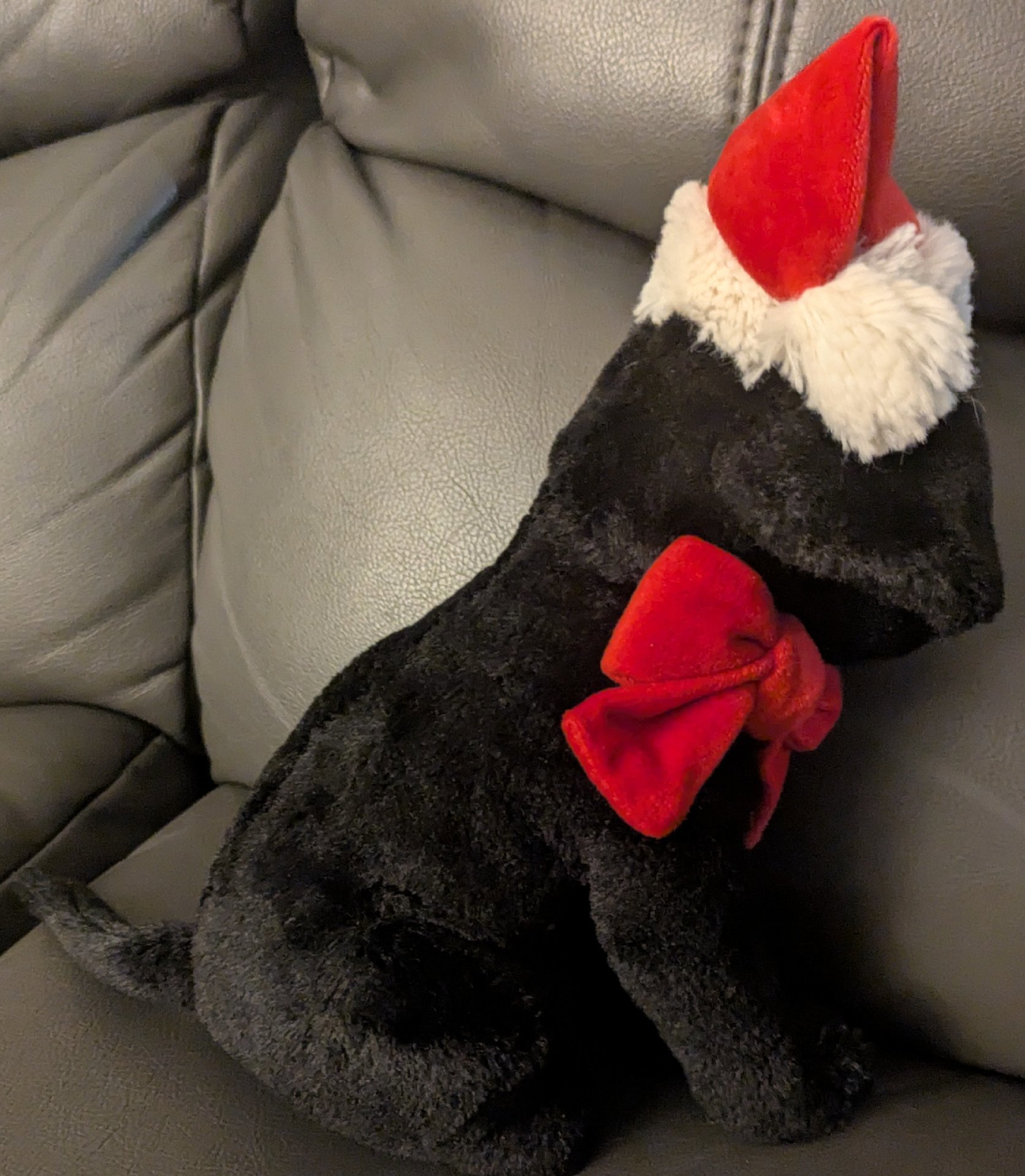 Black Plush Dog Toy with Red Santa Hat and Bow, Jellycat, 50 cm, Excellent condition — preloved on SilentSale®