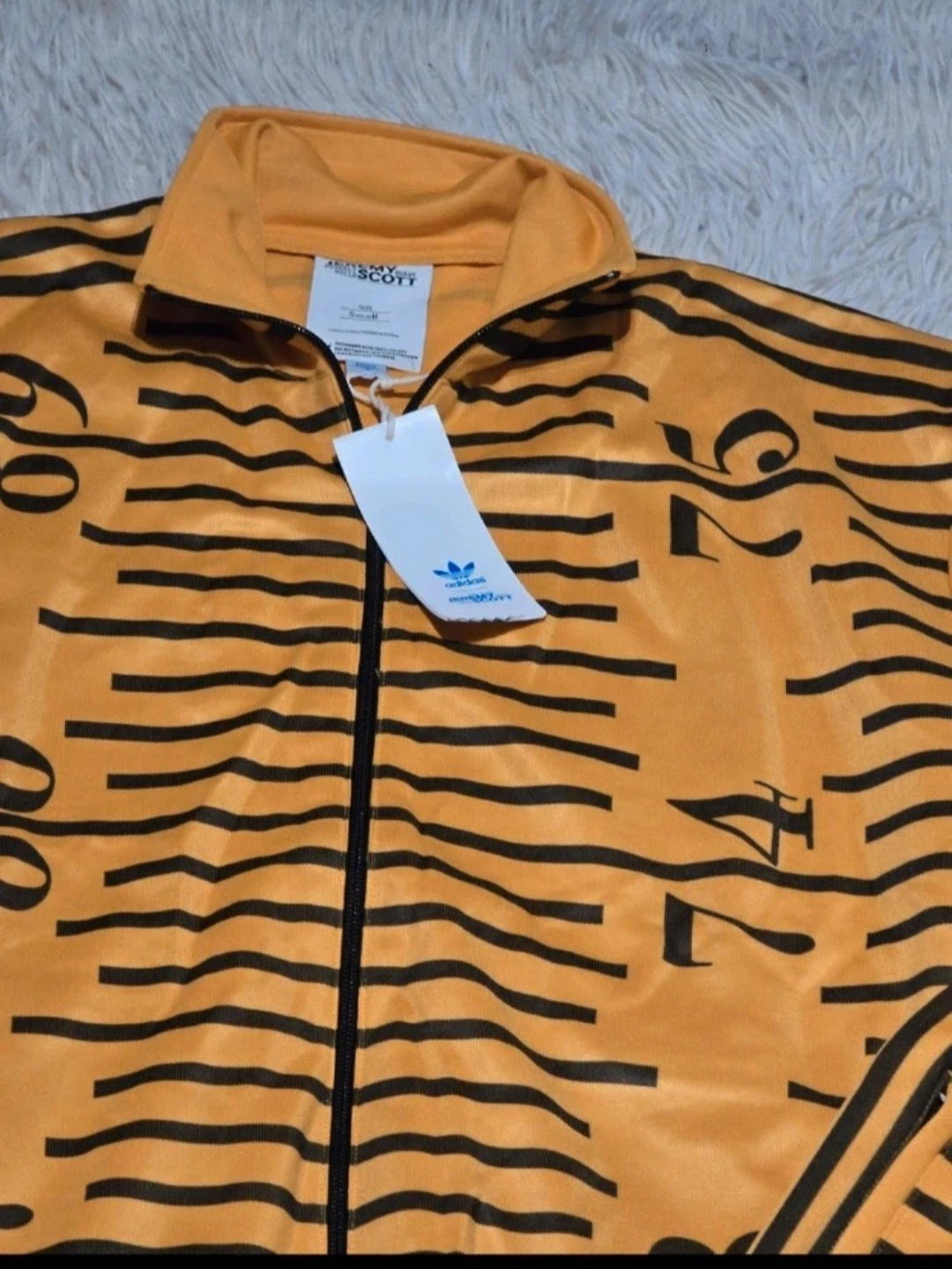 Jeremy Scott Adidas Orange Tape Measure Print Tracksuit Small, Jeremy Scott, S, New condition — preloved on SilentSale®