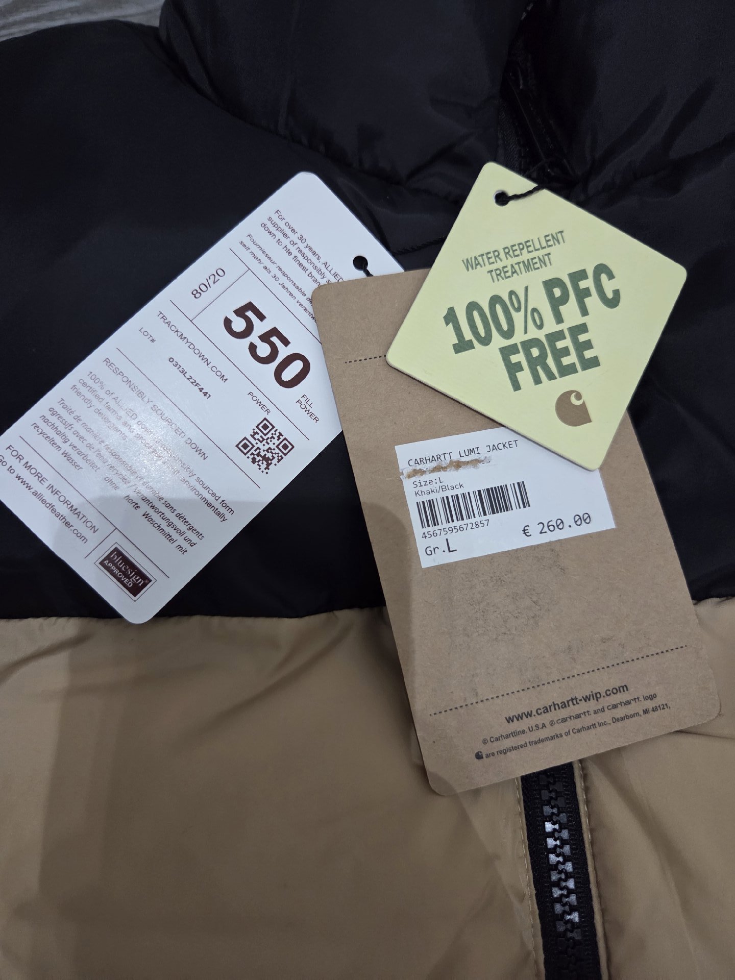 Carhartt Lumi Beige and Black Puffer Jacket – Size L, Carhartt, L, New condition — preloved on SilentSale®