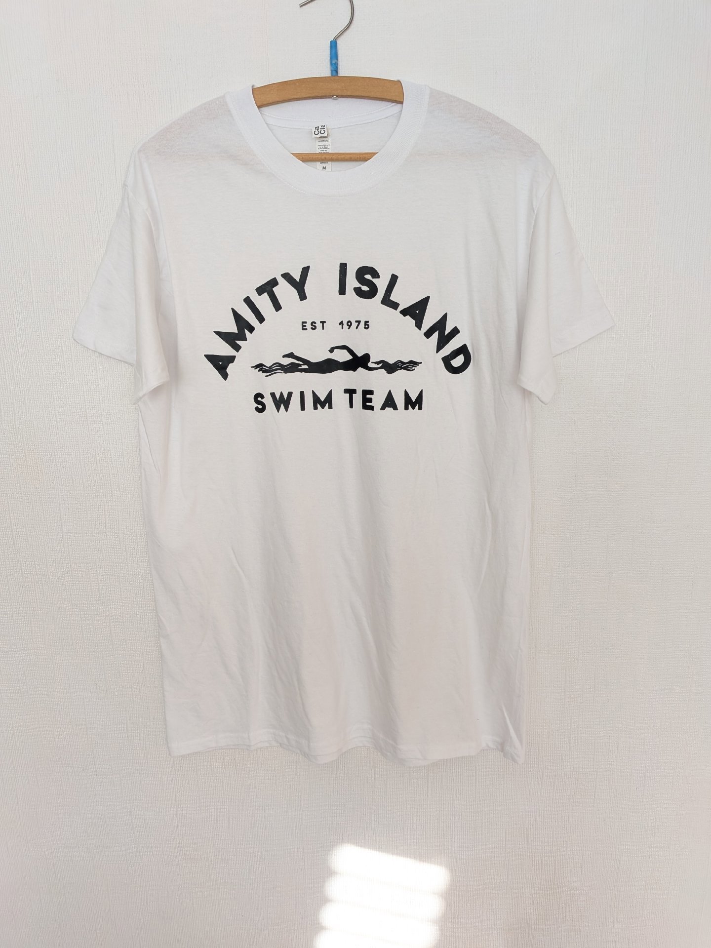Casual Classics White Amity Island Swim Team T-Shirt – M, Casual Classics, M, New condition — preloved on SilentSale®