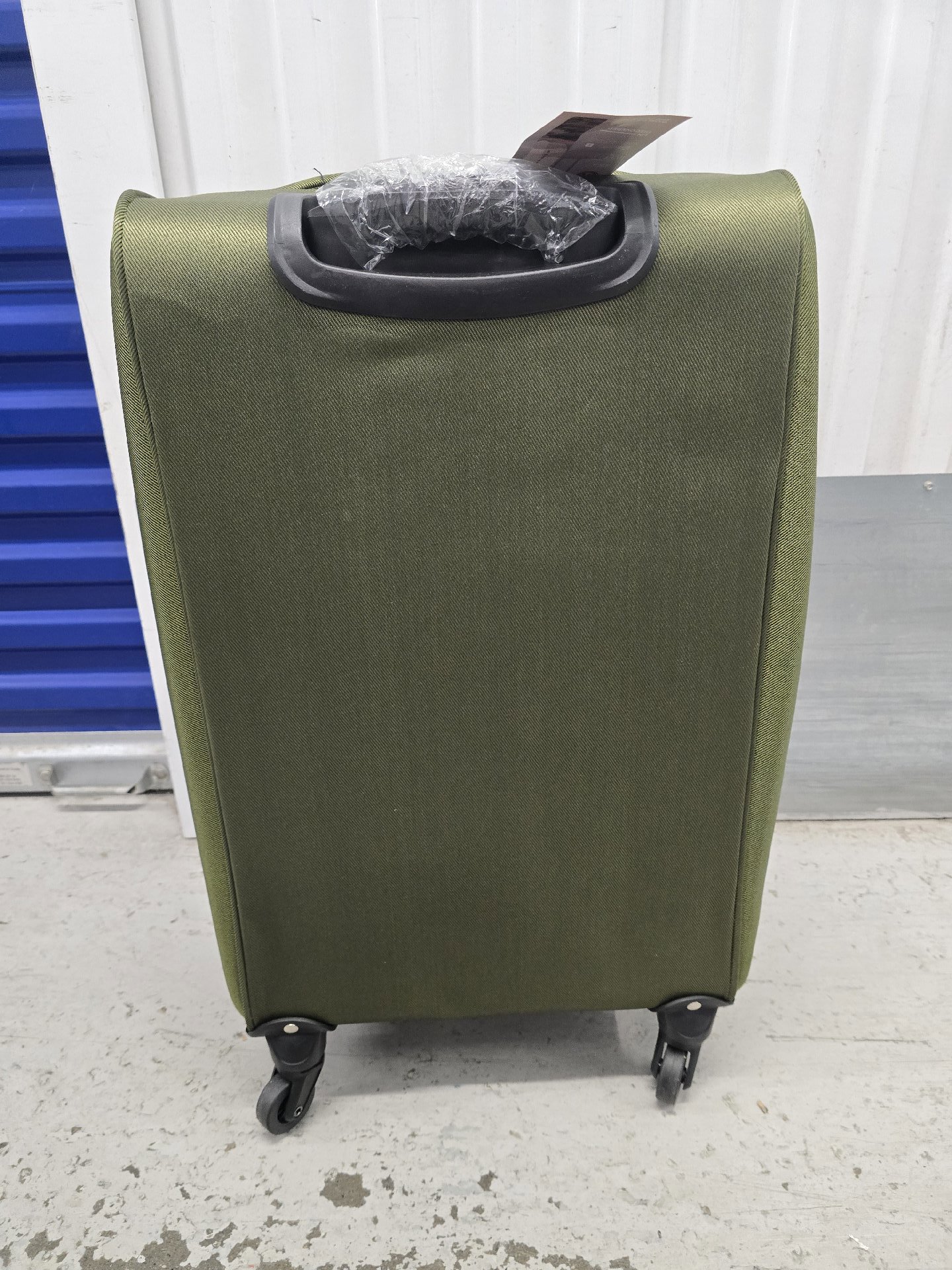 24 inch TN Green Softshell Suitcase with Wheels, TN, One Size, Excellent condition — preloved on SilentSale®