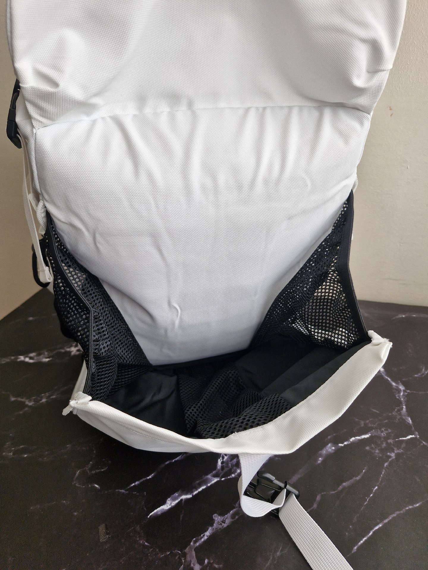 UMGG White Roll Top Backpack with Black Mesh Pockets, Umgg, One Size, New condition — preloved on SilentSale®