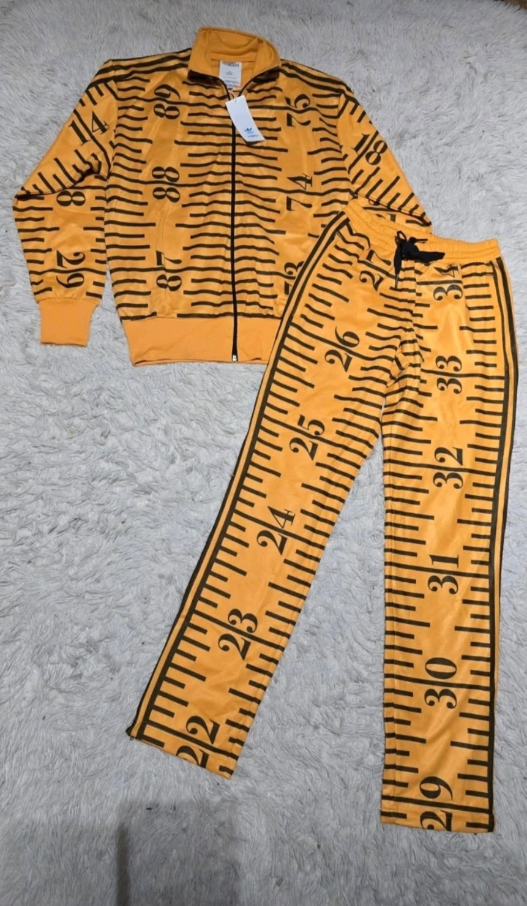 Jeremy Scott Adidas Orange Tape Measure Print Tracksuit Small, Jeremy Scott, S, New condition — preloved on SilentSale®