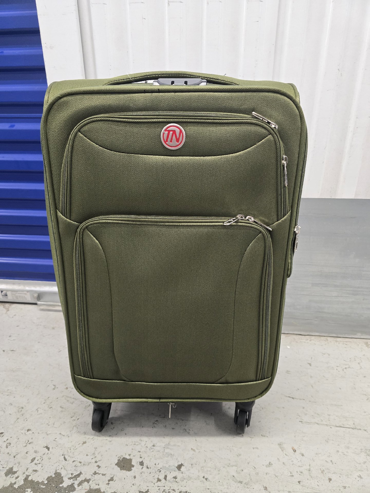 24 inch TN Green Softshell Suitcase with Wheels, TN, One Size, Excellent condition — preloved on SilentSale®
