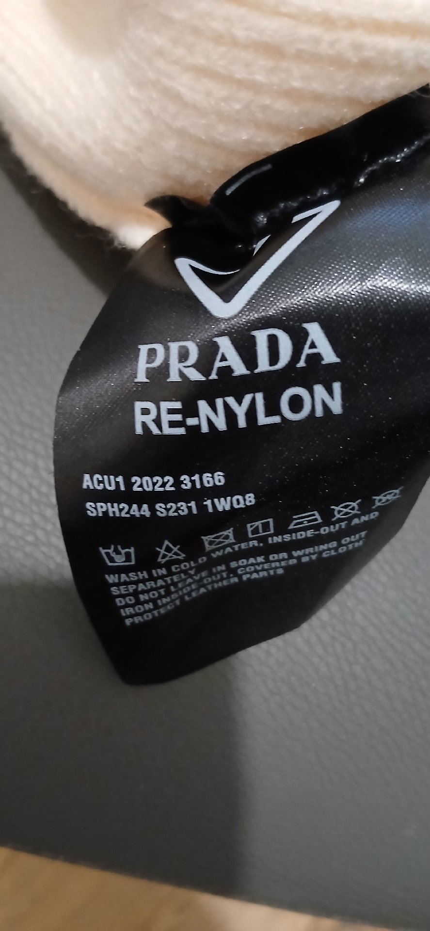 Prada Cream Ribbed Knit Beanie Hat, Prada, M, New condition — preloved on SilentSale®