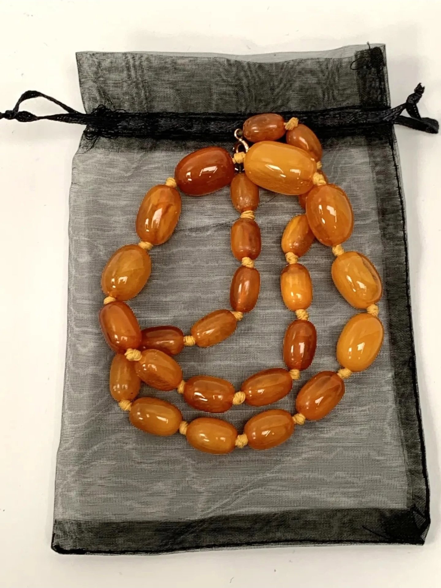 Vintage Amber Bead Necklace with 9ct Gold Clasp: Graduated Oval, 32gm, 50cm, Vintage, One Size, Excellent condition — preloved on SilentSale®