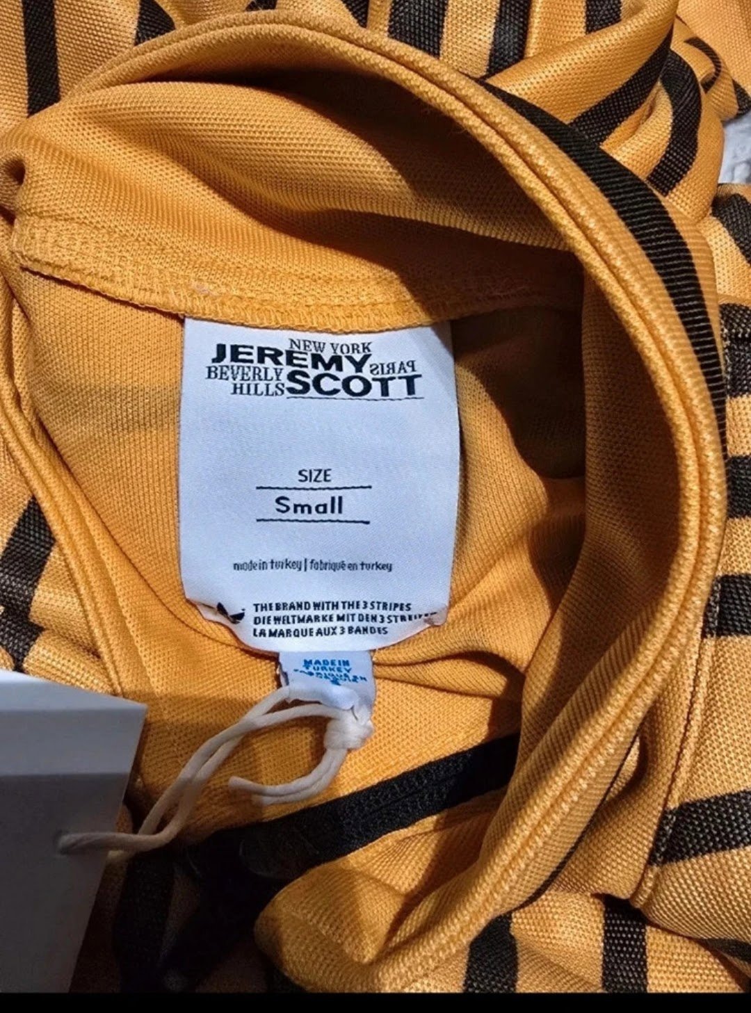 Jeremy Scott Adidas Orange Tape Measure Print Tracksuit Small, Jeremy Scott, S, New condition — preloved on SilentSale®