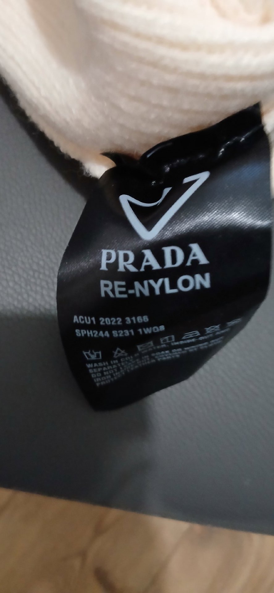 Prada Cream Ribbed Knit Beanie Hat, Prada, M, New condition — preloved on SilentSale®